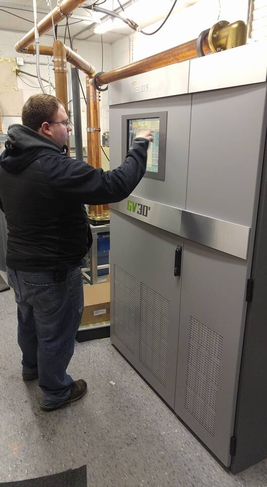 Jake configuring a Nautel GV30 transmitter